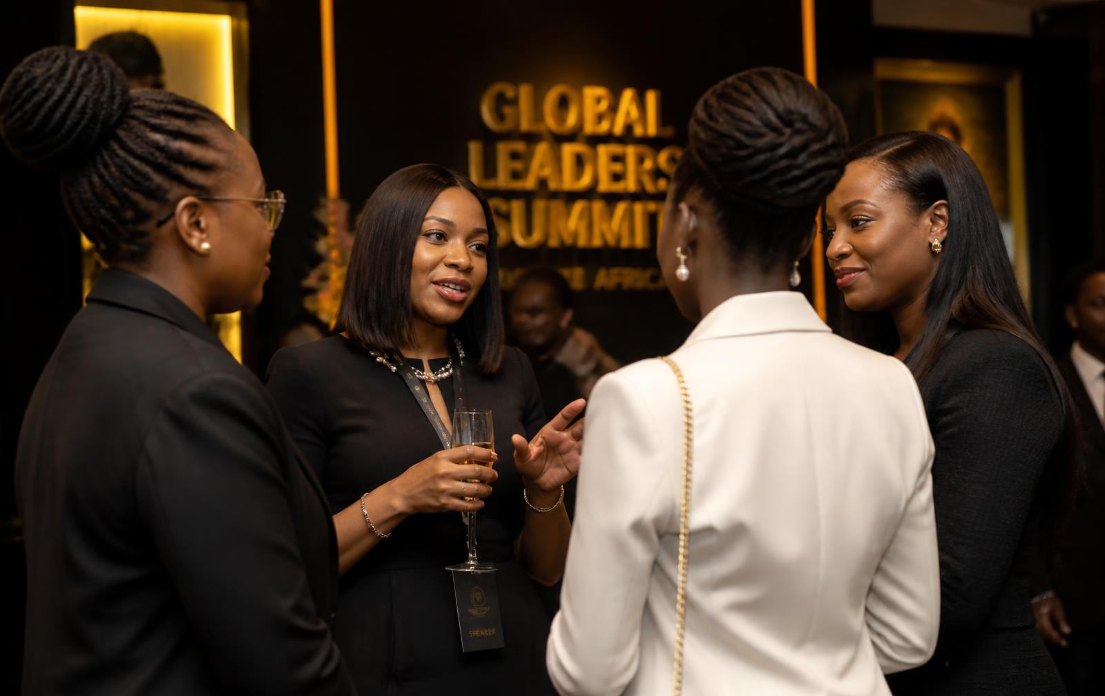 African women executives networking at a premium summit reception